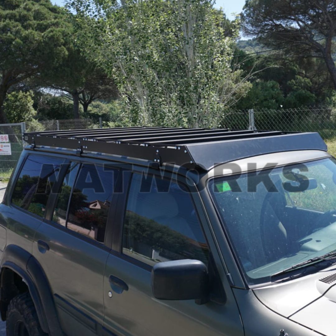 Baca de bajo perfil para nissan gr y61 fabricada por mat works